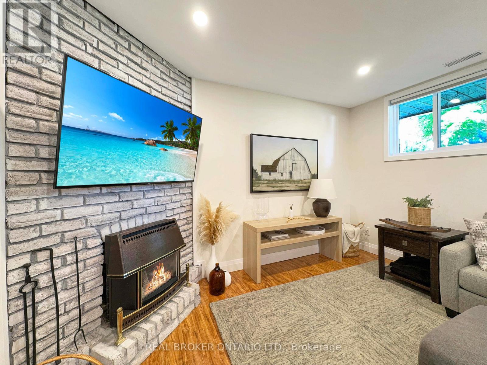 9 Normandy Circle, Norfolk, ON - Indoor With Fireplace