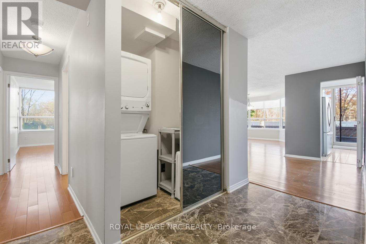 Front Entrance & In-Suite Laundry - 102 - 3 Towering Heights Boulevard, St. Catharines (Glendale/Glenridge), ON - Indoor Photo Showing Laundry Room