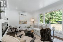 Living Room with Large Window for Natural Light. -