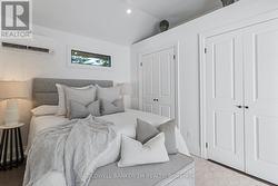 Primary Bedroom with Double Closets & W/O to Deck. -