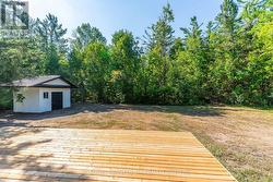 Deck & Large Shed with Concrete Floor & Overhangs. -