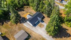 Aerial View of the Home and Driveway. -