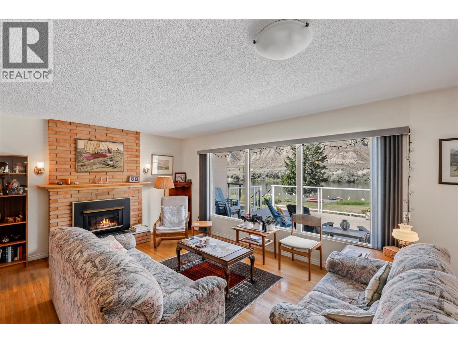 6066 Furrer Road, Kamloops, BC - Indoor Photo Showing Living Room With Fireplace