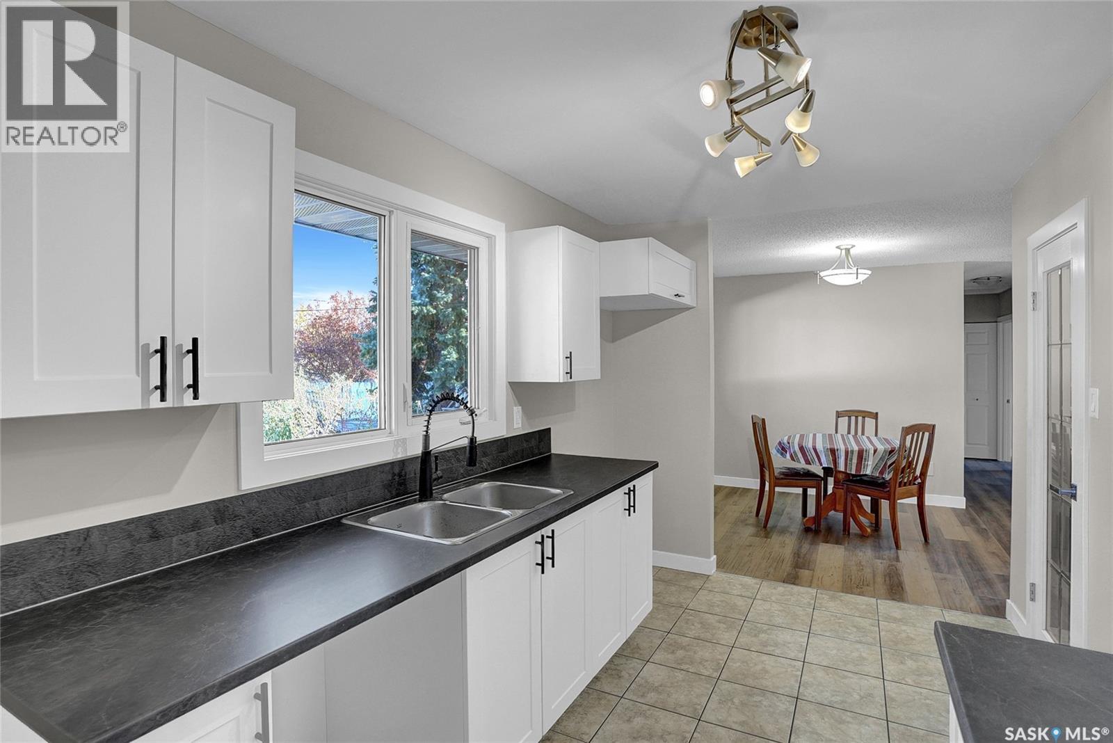 186 Coldwell Road, Regina, SK - Indoor Photo Showing Kitchen With Double Sink