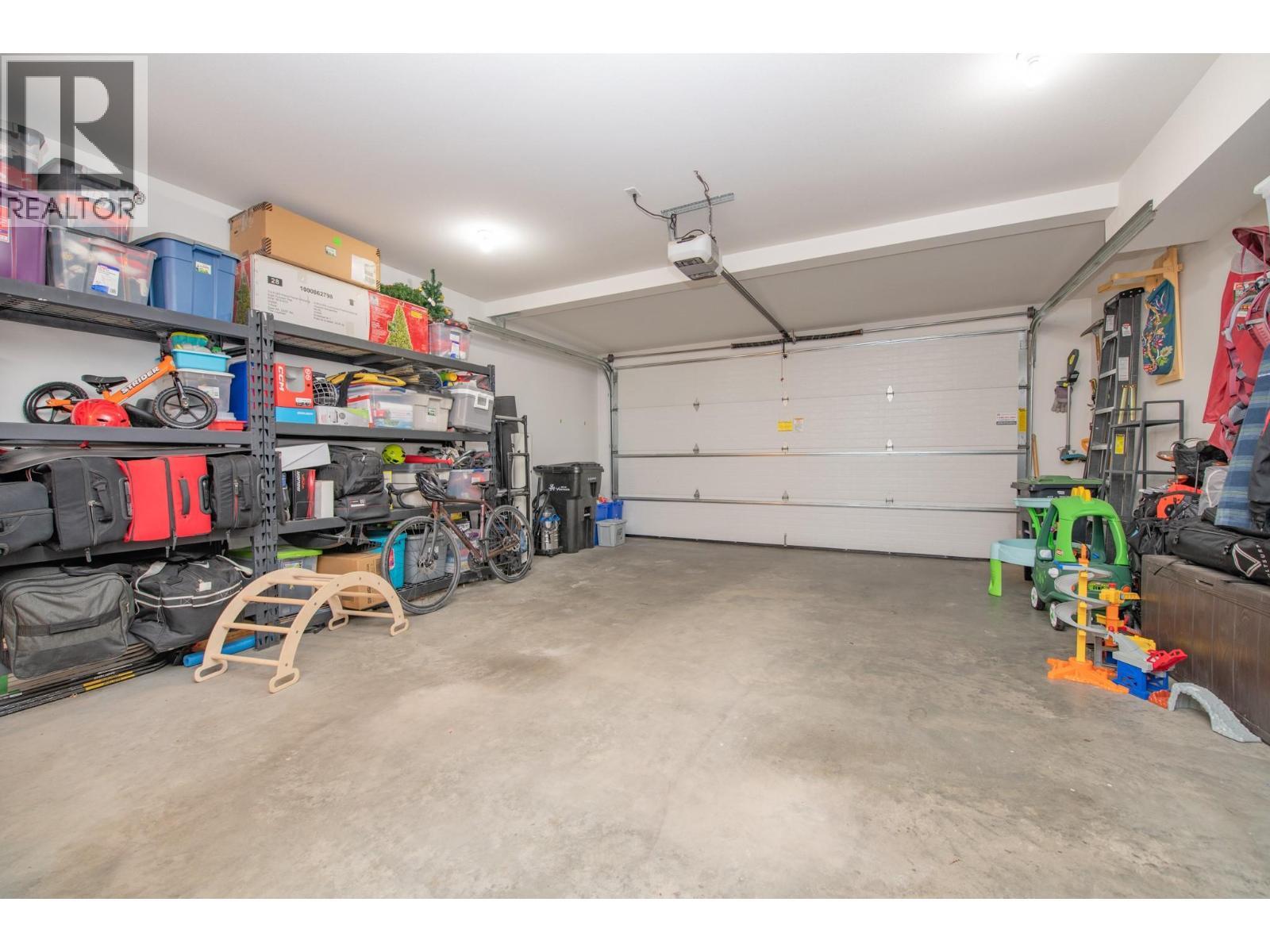 Double Car Garage - 900 Mt. Ida Drive Unit# 23, Vernon, BC - Indoor Photo Showing Garage