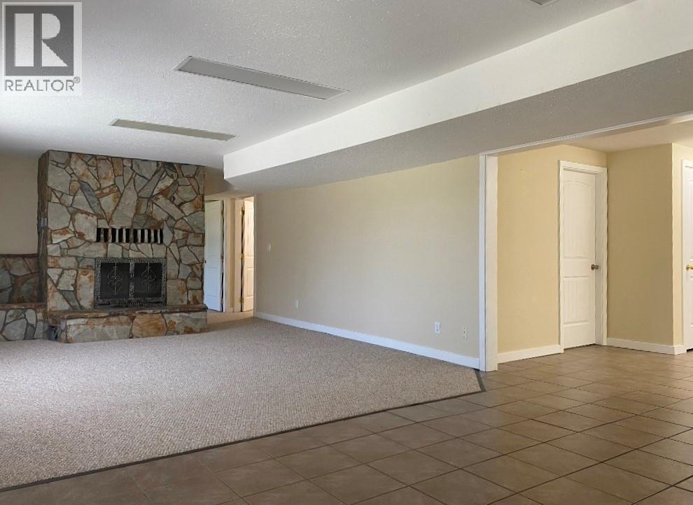 7437 Valley Heights Drive, Grand Forks, BC - Indoor With Fireplace