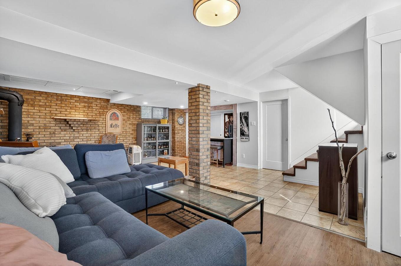 Salle familiale - 311 Rue Lauzanne, Saint-Eustache, QC - Indoor Photo Showing Other Room