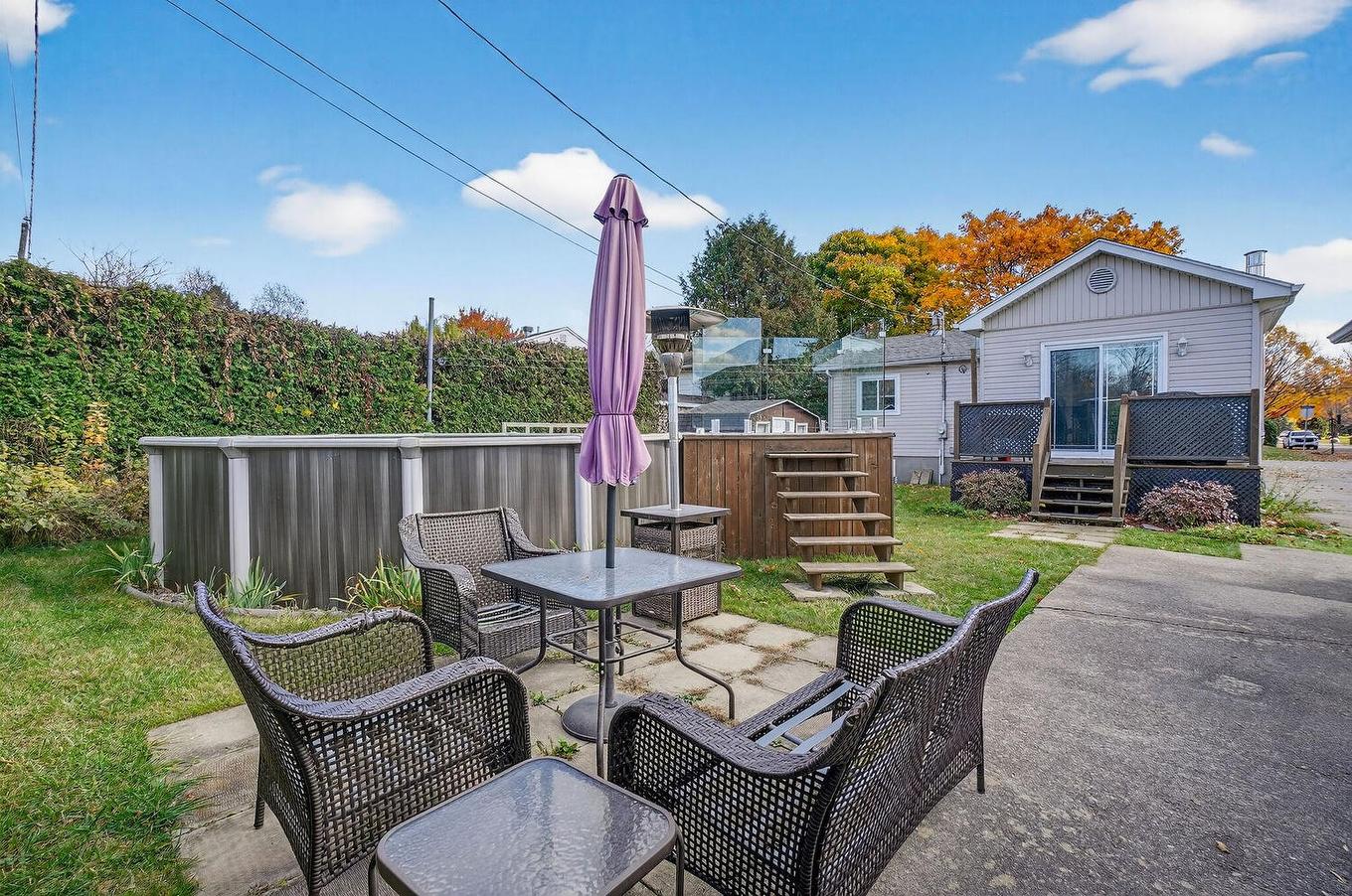 Cour - 311 Rue Lauzanne, Saint-Eustache, QC - Outdoor With Deck Patio Veranda