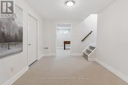 Lower Landing, Stairway W/Wainscott, Open Concept -