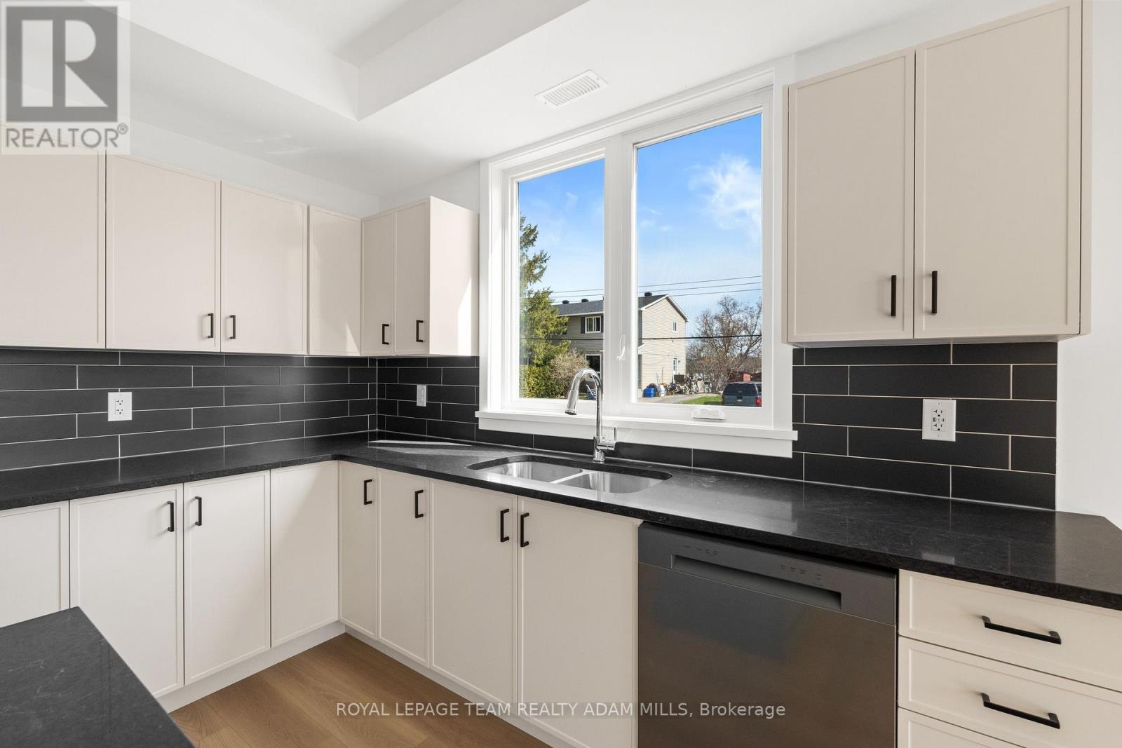 Photo of a similar model. Finishes may vary. - 2 - 1104 A Moore Street, Brockville, ON - Indoor Photo Showing Kitchen With Double Sink