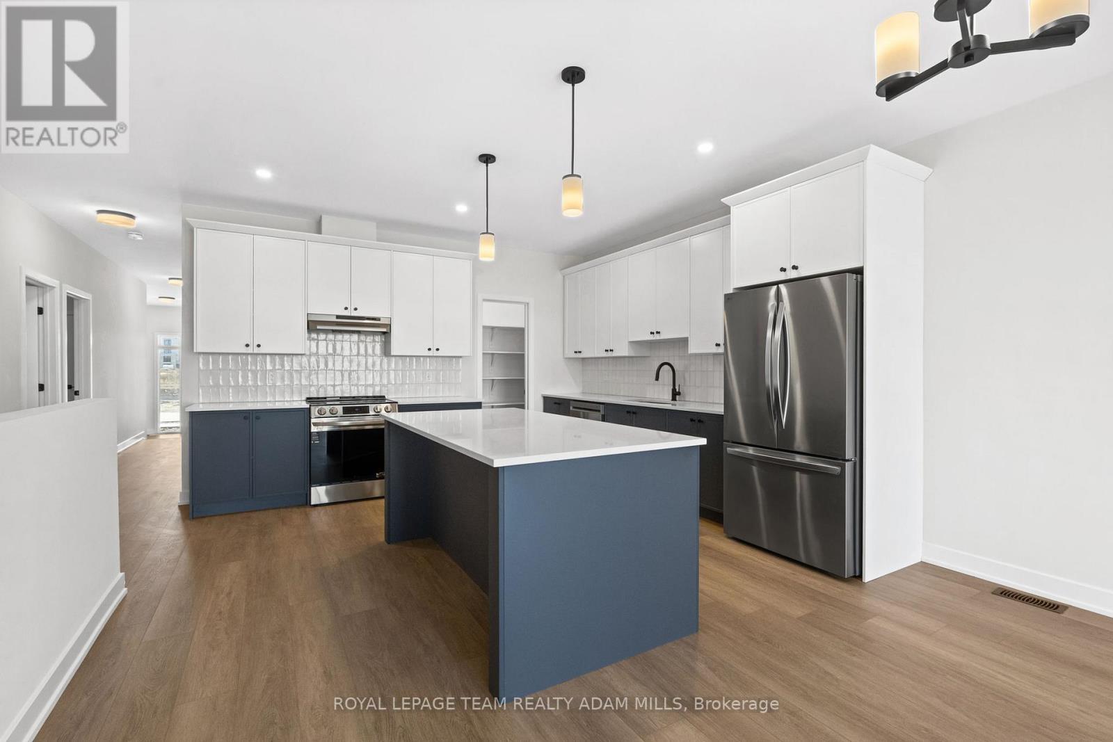 Photo of a similar model. Finishes may vary. - 2 - 1104 A Moore Street, Brockville, ON - Indoor Photo Showing Kitchen With Upgraded Kitchen