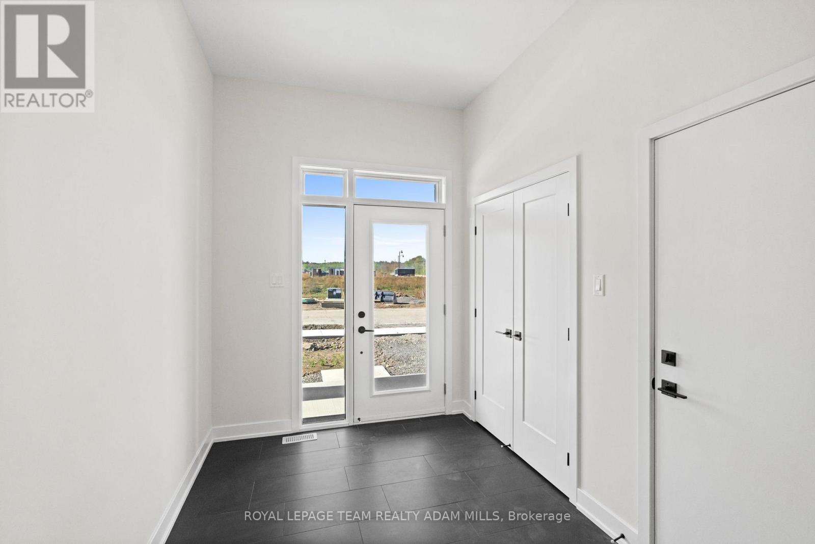 Photo of a similar model. Finishes may vary. - 2 - 1104 A Moore Street, Brockville, ON - Indoor Photo Showing Other Room