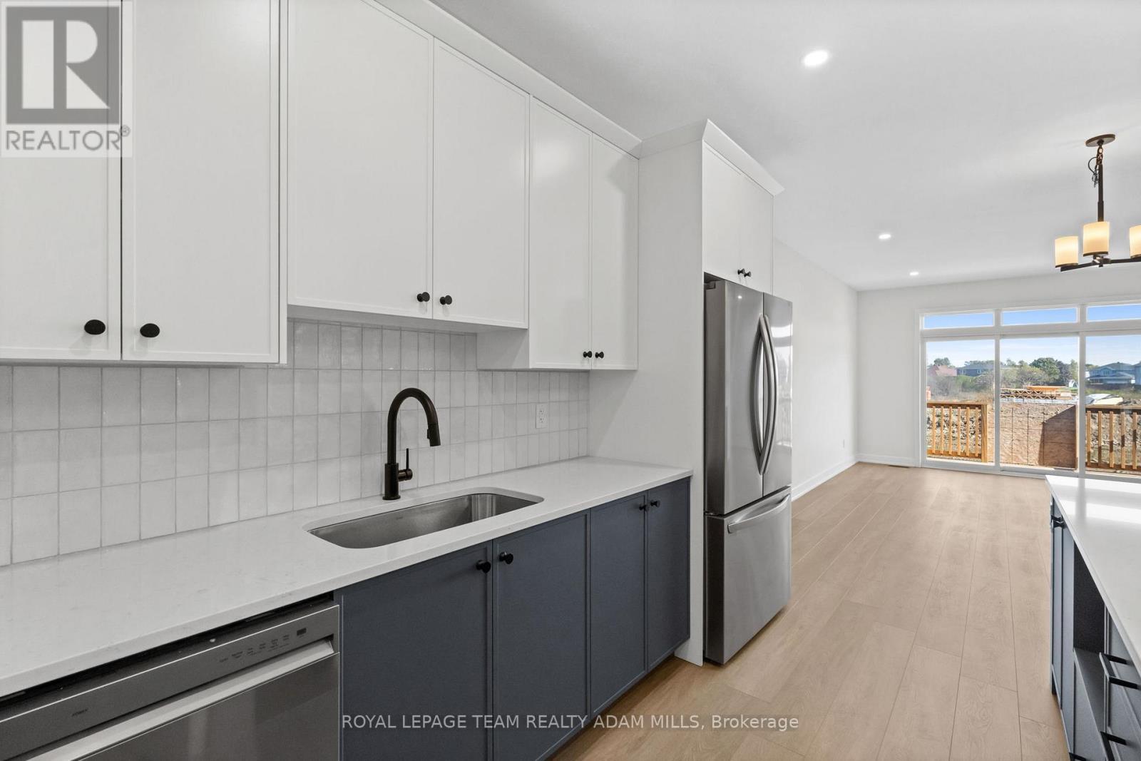 Photo of a similar model. Finishes may vary. - 2 - 1104 A Moore Street, Brockville, ON - Indoor Photo Showing Kitchen