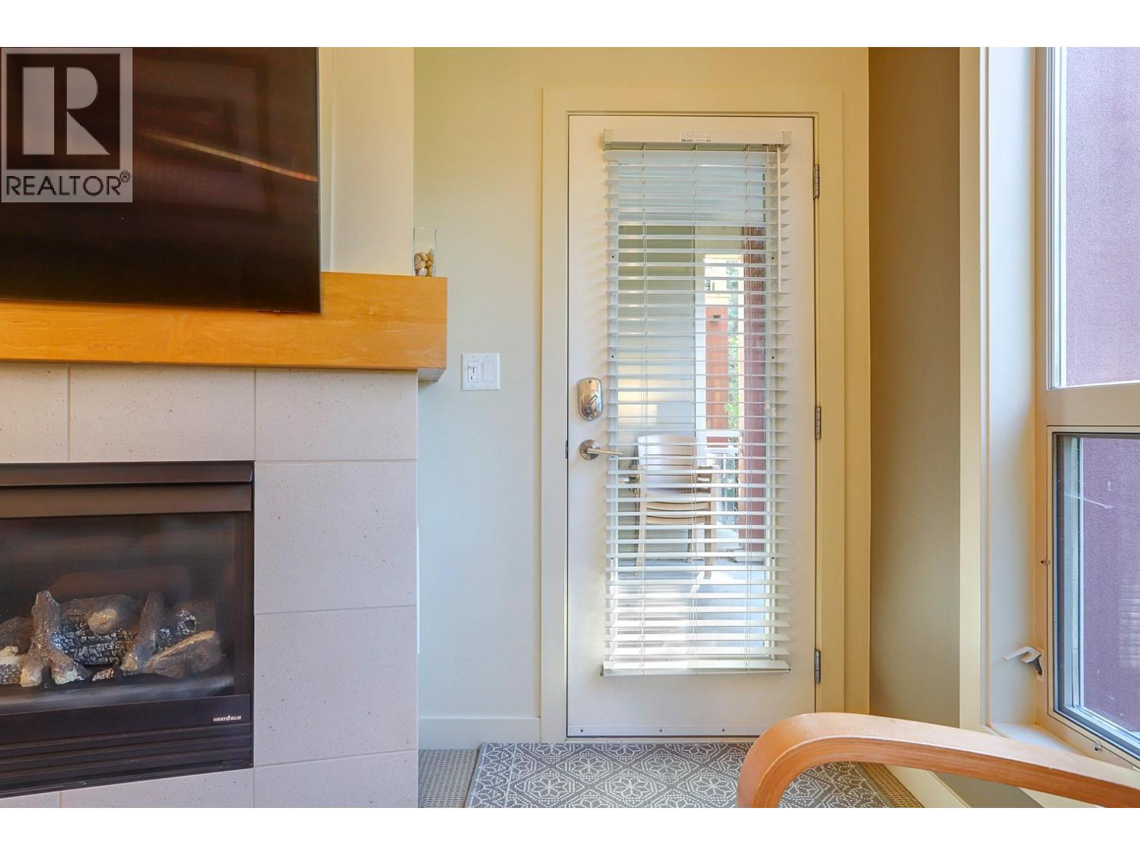 7343 Okanagan Landing Road Unit# 1114, Vernon, BC - Indoor With Fireplace