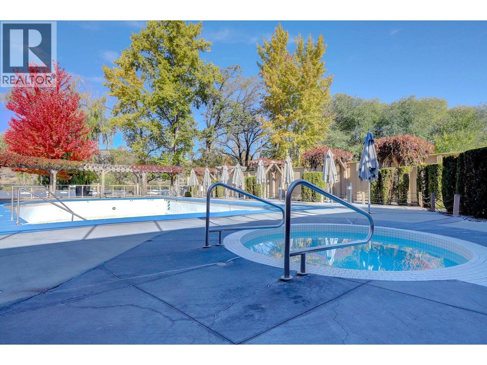 7343 Okanagan Landing Road Unit# 1114, Vernon, BC - Outdoor With In Ground Pool
