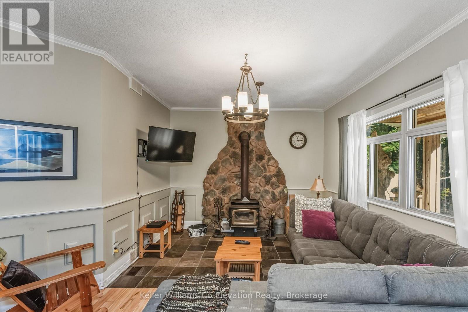 19 Huron Trail, Georgian Bay (Baxter), ON - Indoor Photo Showing Living Room With Fireplace