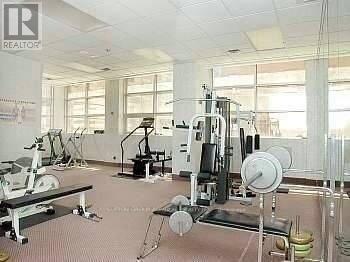 409 - 736 Bay Street, Toronto, ON - Indoor Photo Showing Gym Room