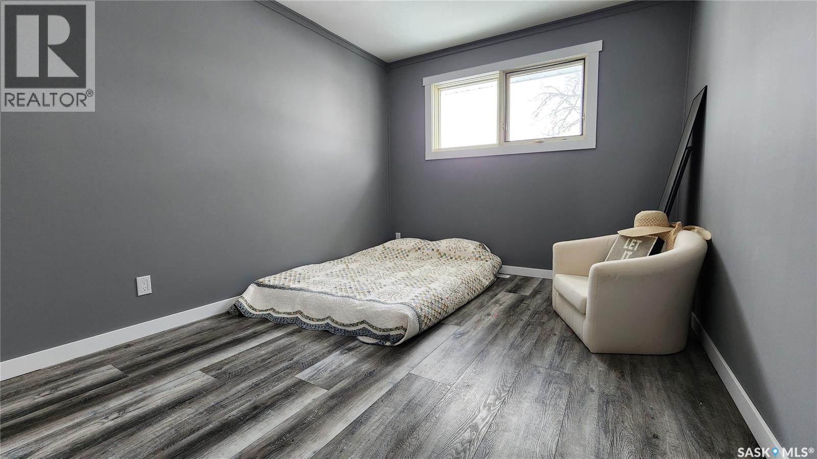 208 4Th Street W, Wilkie, SK - Indoor Photo Showing Bedroom