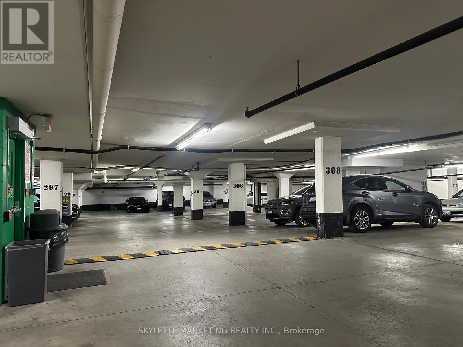 Gv216 - 8 Rean Drive, Toronto, ON - Indoor Photo Showing Garage