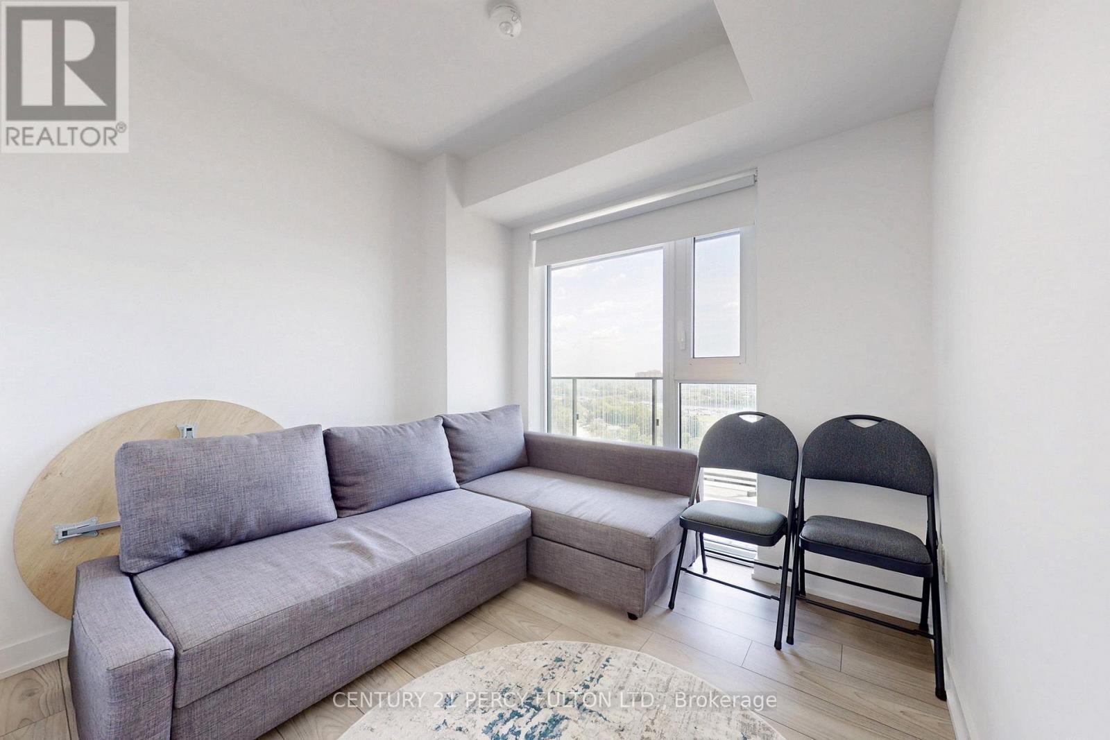1305 - 8 Tippett Road, Toronto, ON - Indoor Photo Showing Living Room