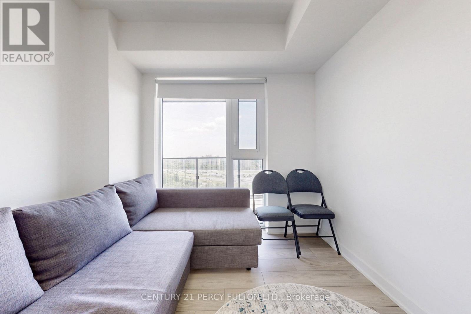 1305 - 8 Tippett Road, Toronto, ON - Indoor Photo Showing Living Room