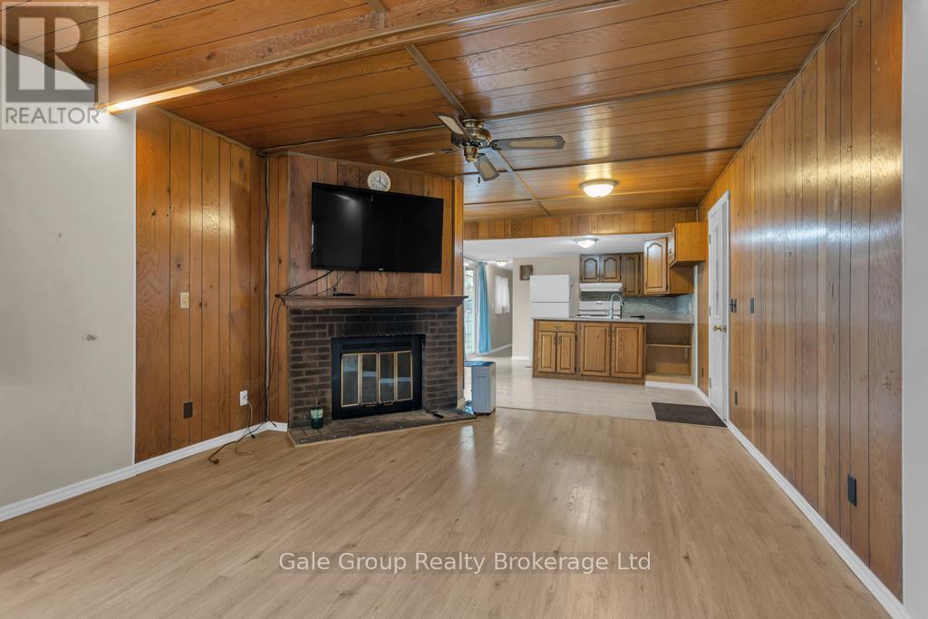 596101 Hwy 59 Tropicana #15 Crescent E, East Zorra-Tavistock (Hidden Valley), ON - Indoor Photo Showing Other Room With Fireplace