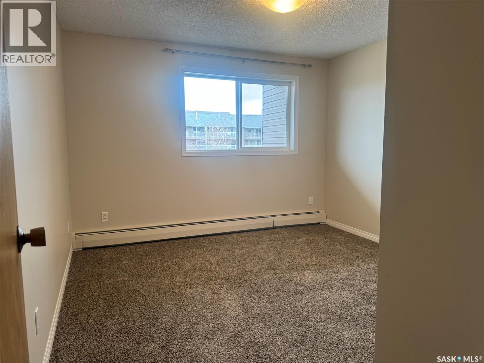 207 1808 Eaglesham Avenue, Weyburn, SK - Indoor Photo Showing Other Room