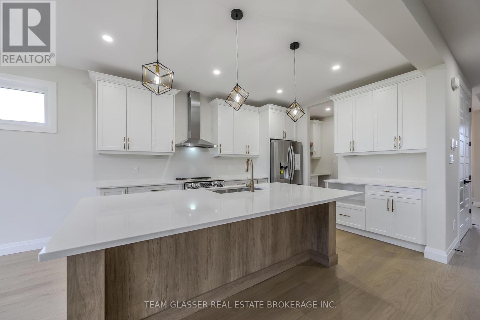 Lot 17 - 71 Dearing Drive, South Huron (Stephen), ON - Indoor Photo Showing Kitchen With Upgraded Kitchen