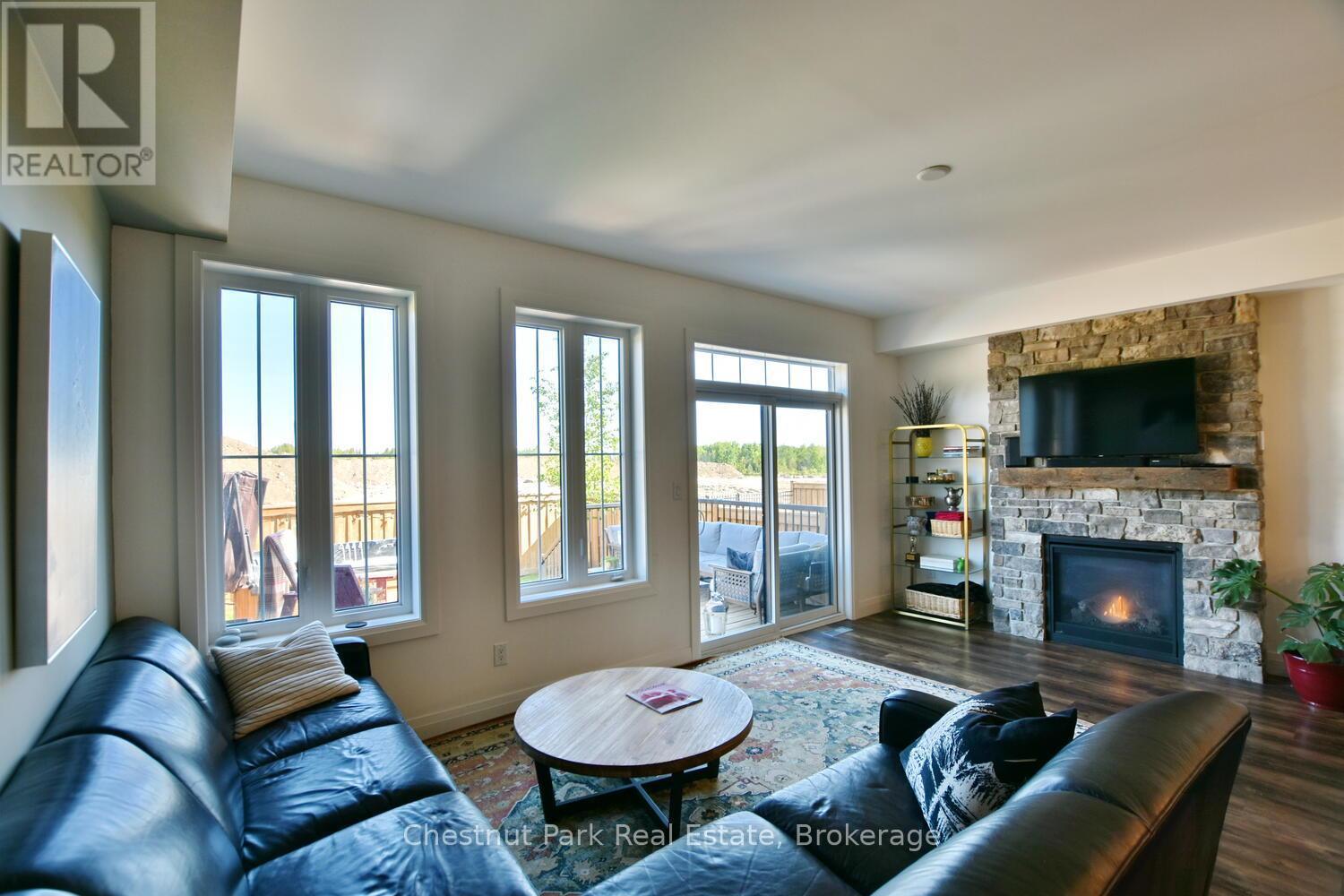 146 Red Pine Street, Blue Mountains, ON - Indoor Photo Showing Living Room With Fireplace