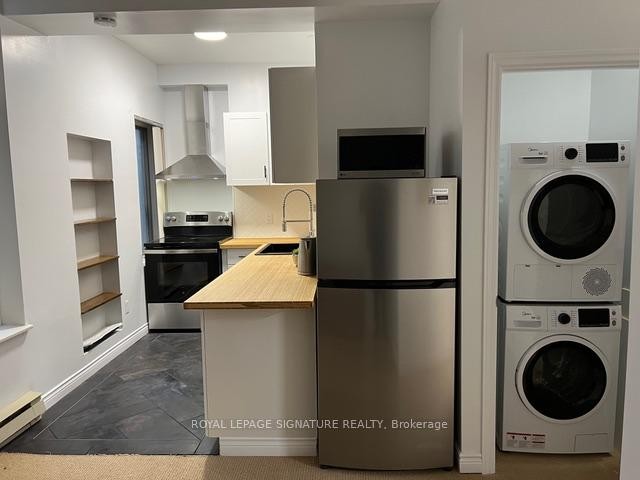 Main-208 Carlton Street, Toronto, ON - Indoor Photo Showing Laundry Room