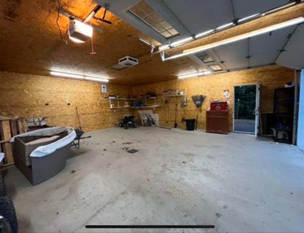 Garage - 61 Rue Éliette, Saint-Côme, QC - Indoor Photo Showing Garage