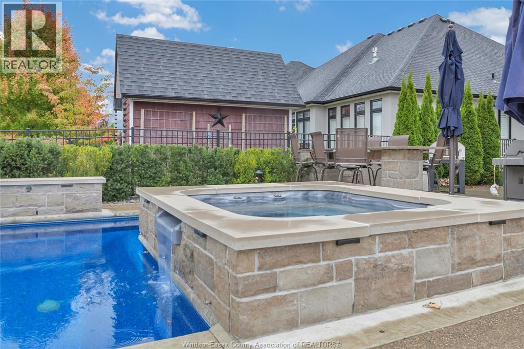 102 Hayes Avenue, Tecumseh, ON - Outdoor With In Ground Pool