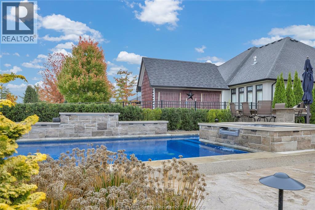 102 Hayes Avenue, Tecumseh, ON - Outdoor With In Ground Pool