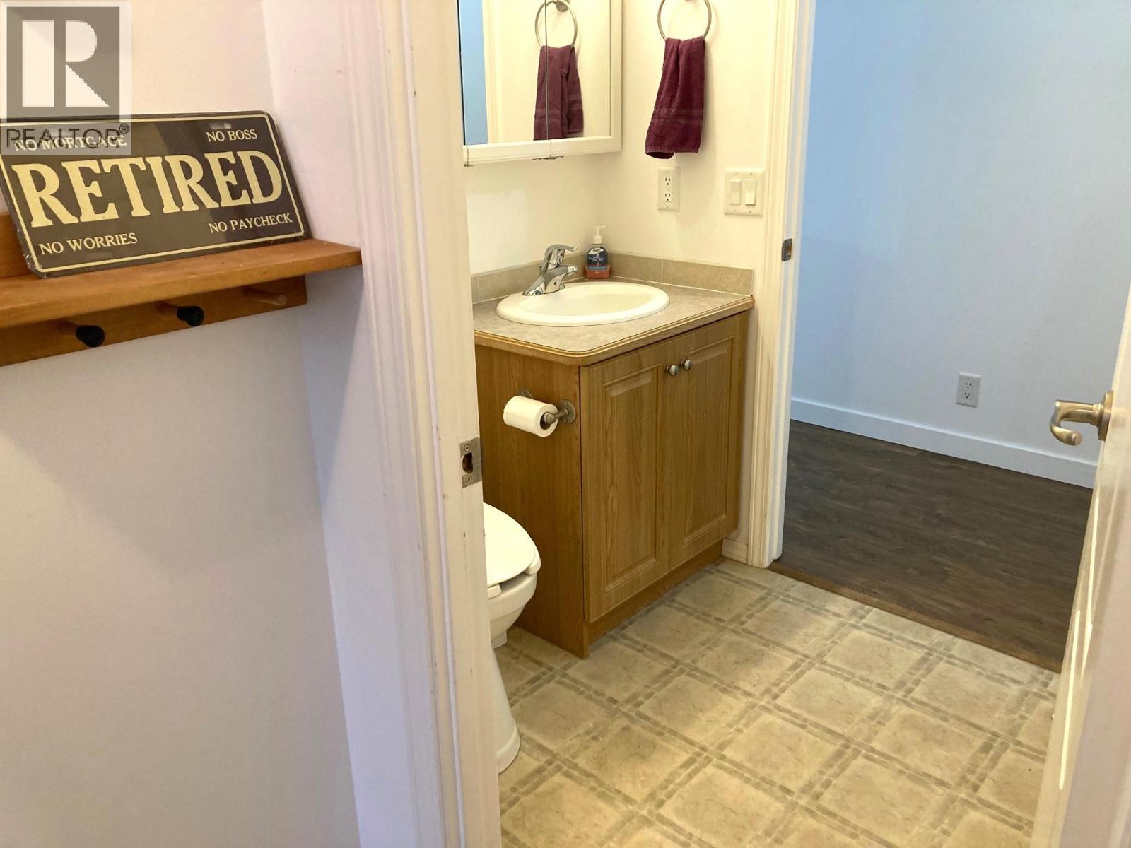 access to main bathroom from laundry room - 1510 Trans Canada Highway Unit# 63, Sorrento, BC