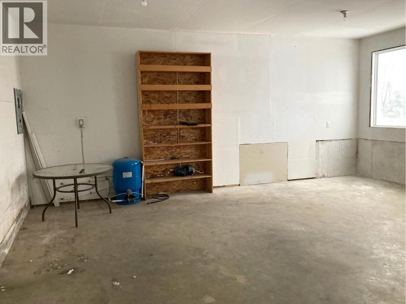 access hatch to under trailer in the wall - 1510 Trans Canada Highway Unit# 63, Sorrento, BC