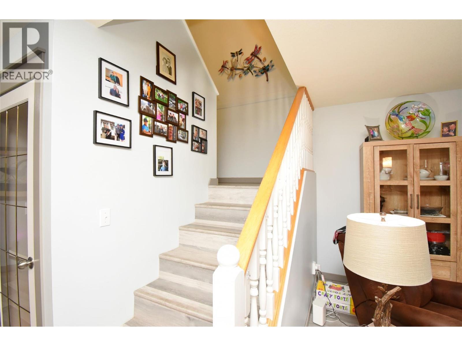 Stairs to 2nd floor - 4404 20 Street Unit# 3, Vernon, BC - Indoor Photo Showing Other Room