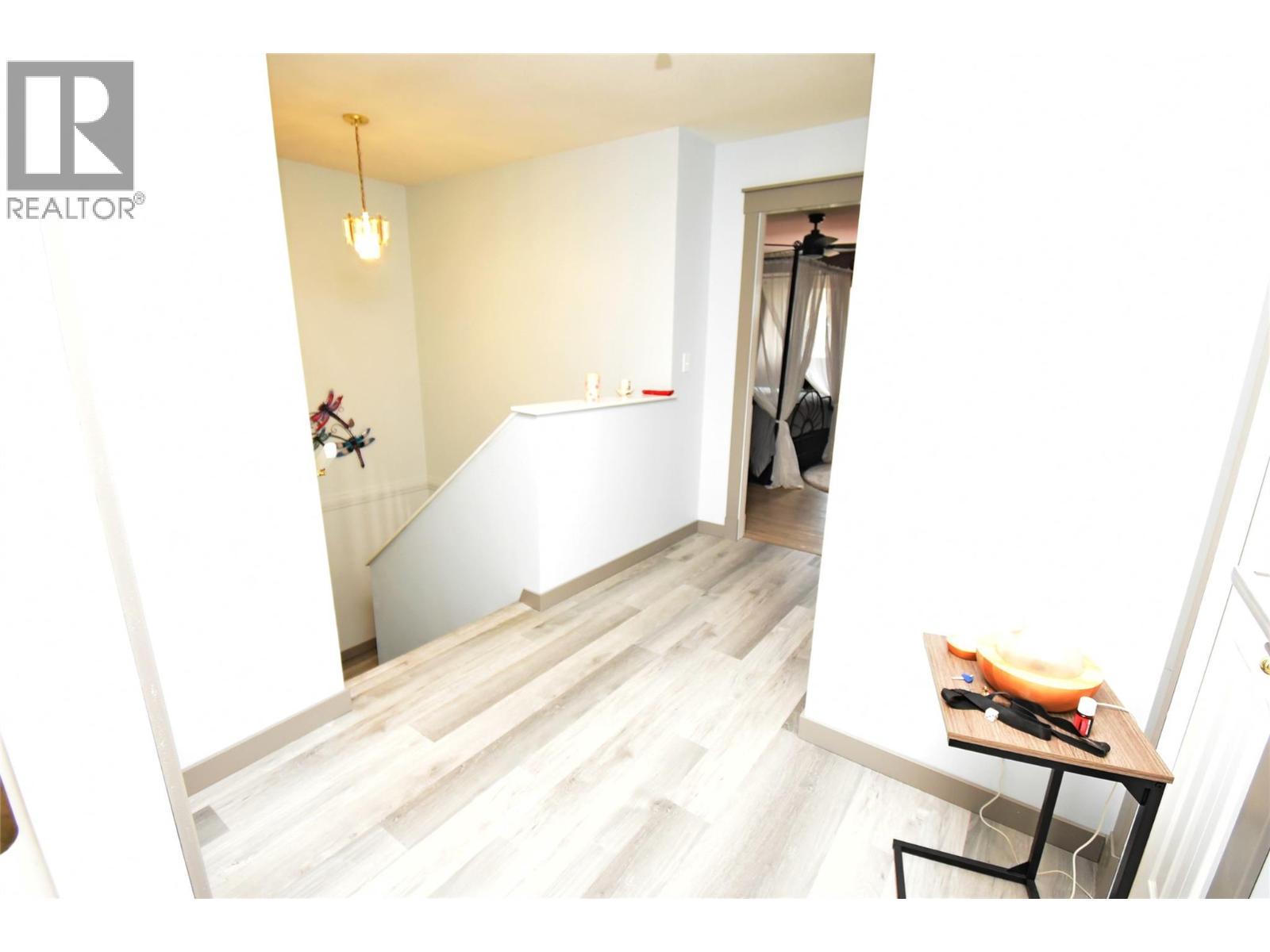 Landing area on 2nd floor - 4404 20 Street Unit# 3, Vernon, BC - Indoor Photo Showing Other Room