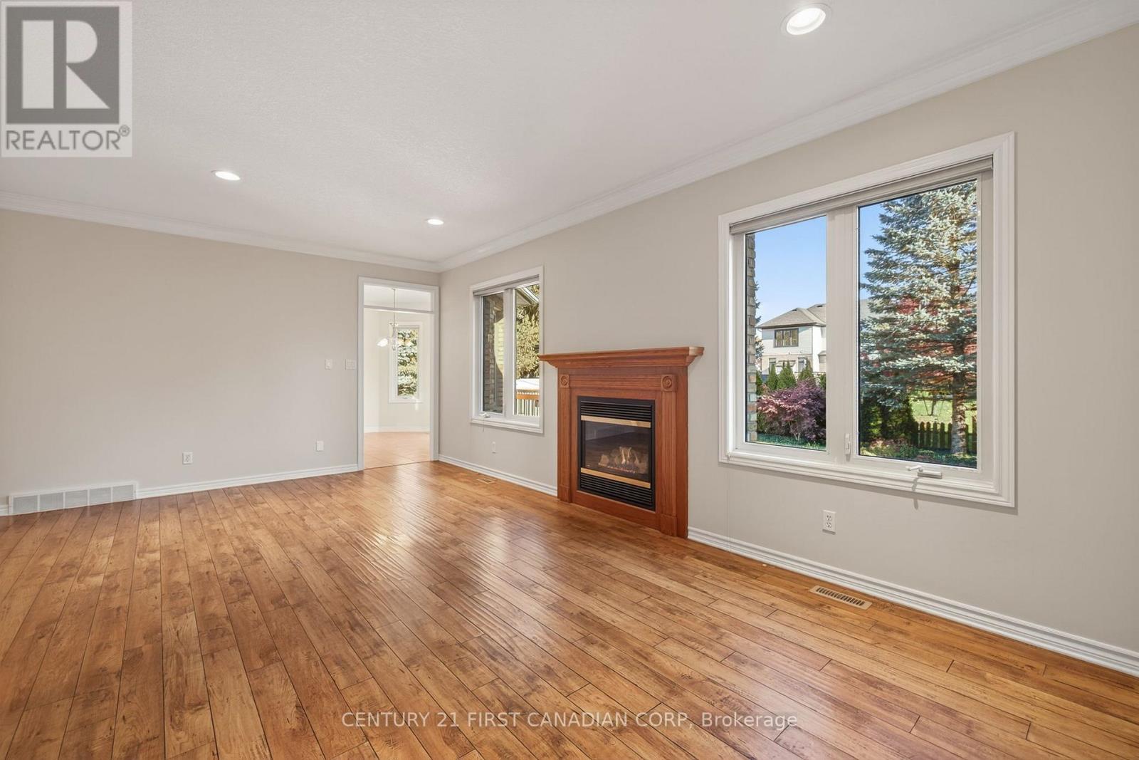 2616 Emerson Street, Strathroy-Caradoc (Mount Brydges), ON - Indoor Photo Showing Other Room With Fireplace