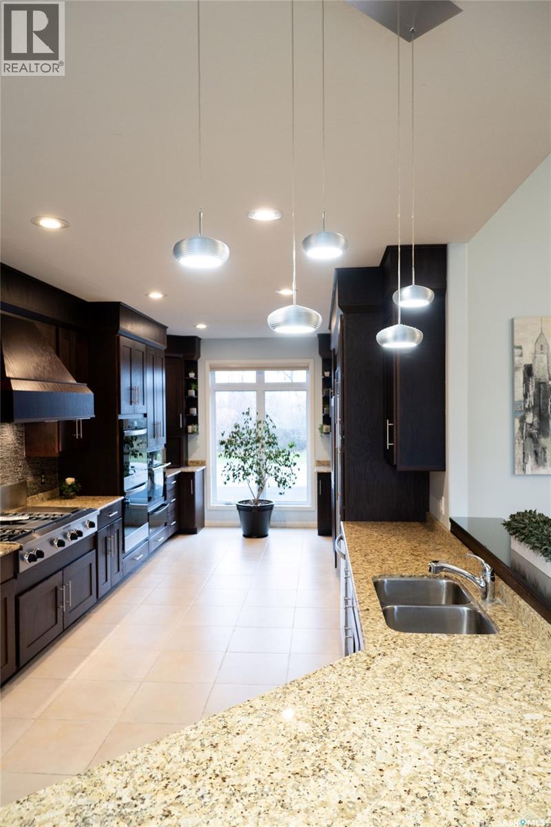15 Broadway Street S, Redvers, SK - Indoor Photo Showing Kitchen With Double Sink