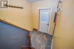 Entrance to the upper apartment -