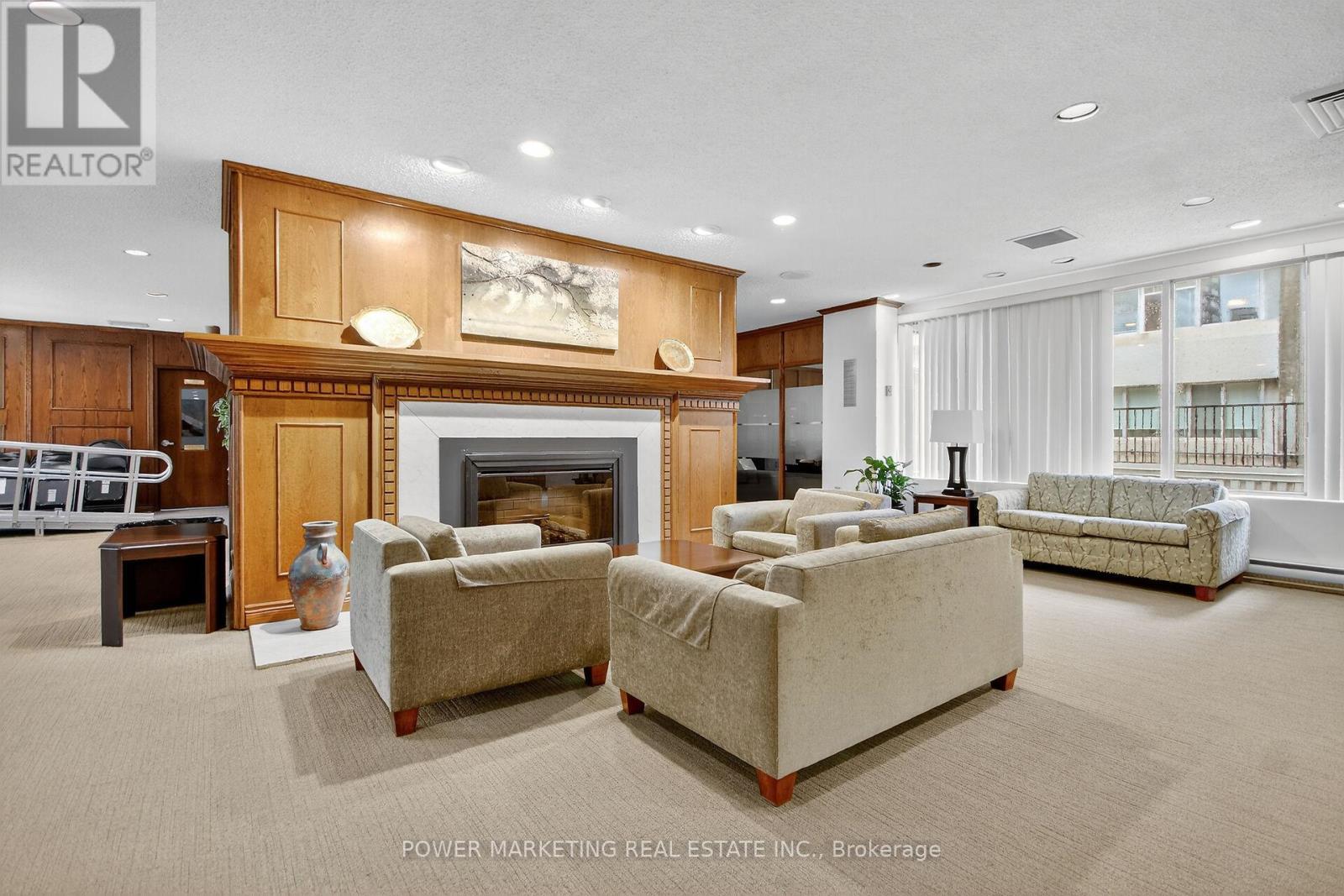 2806 - 500 Laurier Avenue W, Ottawa, ON - Indoor Photo Showing Living Room With Fireplace