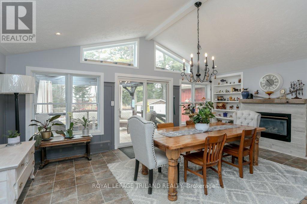 4 Grace Court, Bayham (Port Burwell), ON - Indoor Photo Showing Dining Room With Fireplace