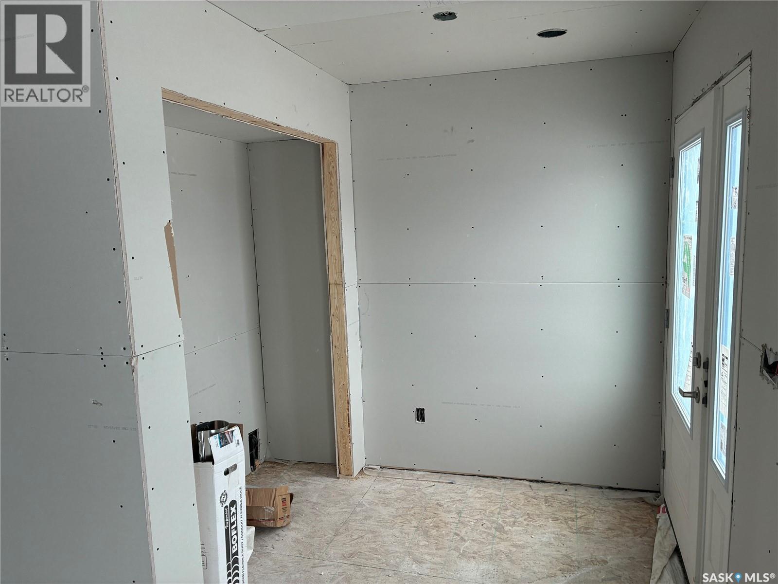 13 Clement Road, Lanigan, SK - Indoor Photo Showing Garage
