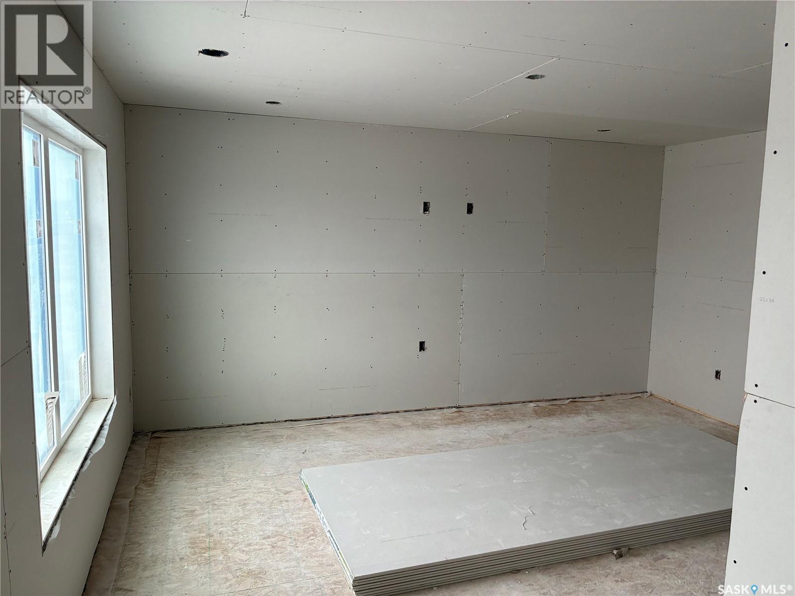 13 Clement Road, Lanigan, SK - Indoor Photo Showing Garage