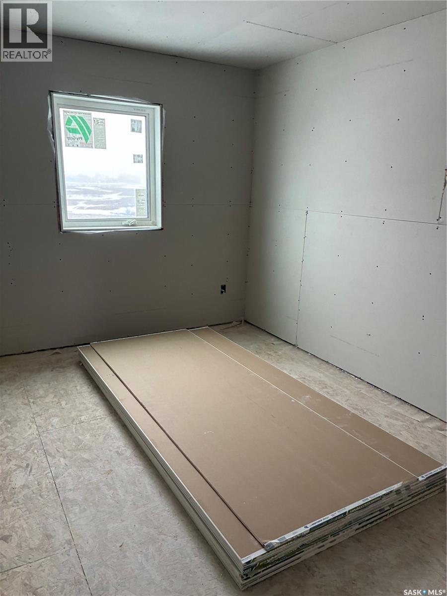 13 Clement Road, Lanigan, SK - Indoor Photo Showing Garage