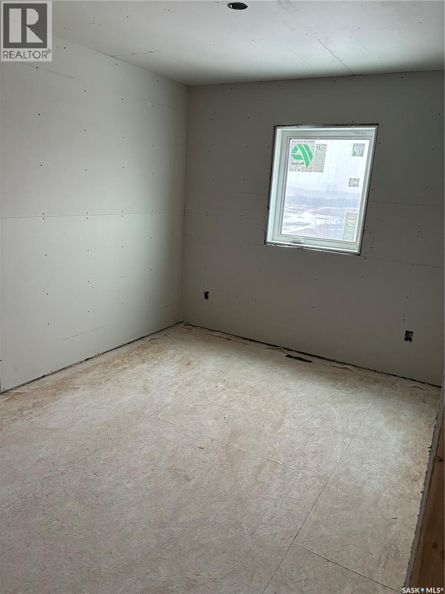 13 Clement Road, Lanigan, SK - Indoor Photo Showing Garage
