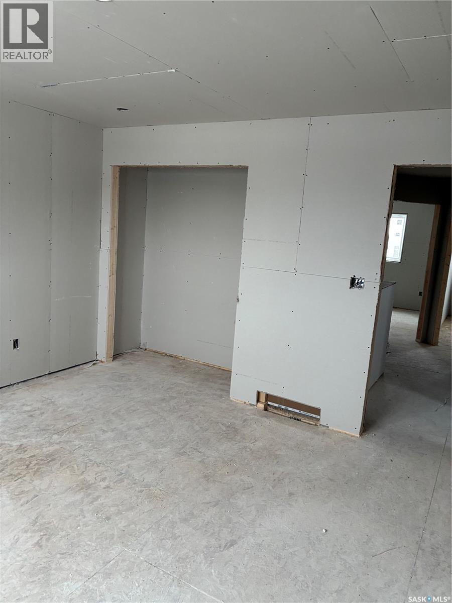 13 Clement Road, Lanigan, SK - Indoor Photo Showing Garage