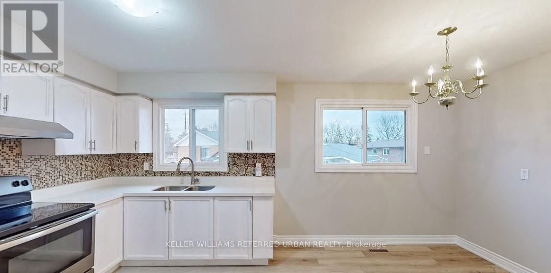 133 Manitou Crescent, Brampton, ON - Indoor Photo Showing Kitchen With Double Sink