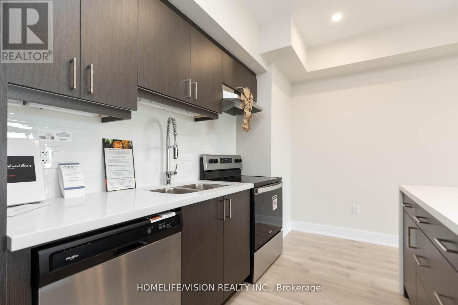 312 - 1 Chef Lane, Barrie, ON - Indoor Photo Showing Kitchen With Double Sink