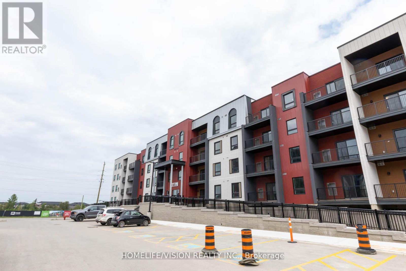 312 - 1 Chef Lane, Barrie, ON - Outdoor With Balcony With Facade